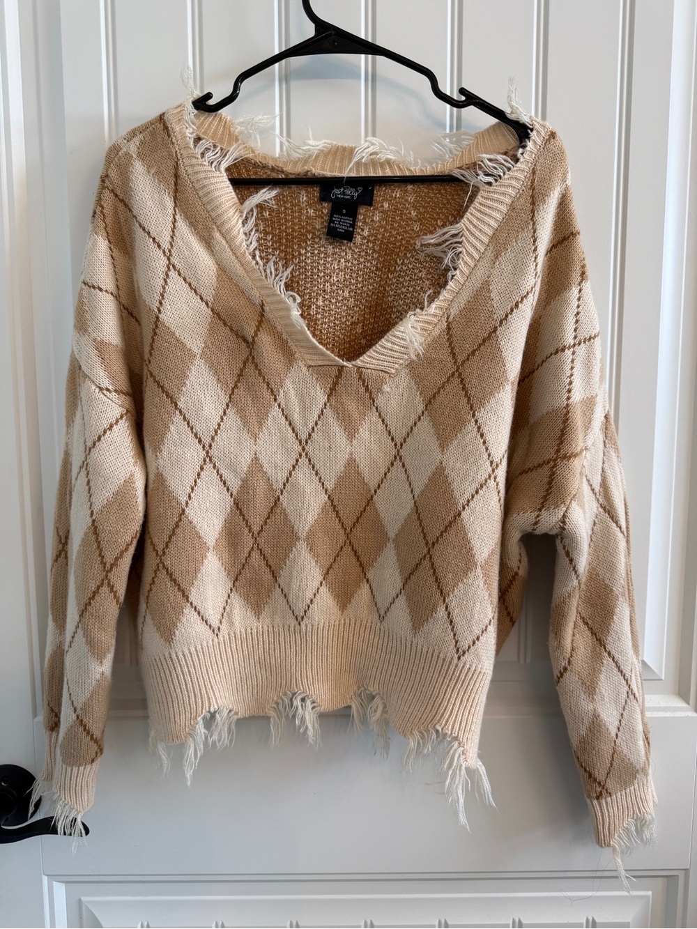 Women's Distressed Boho V-Neck Argyle Sweater by Just Polly size small.